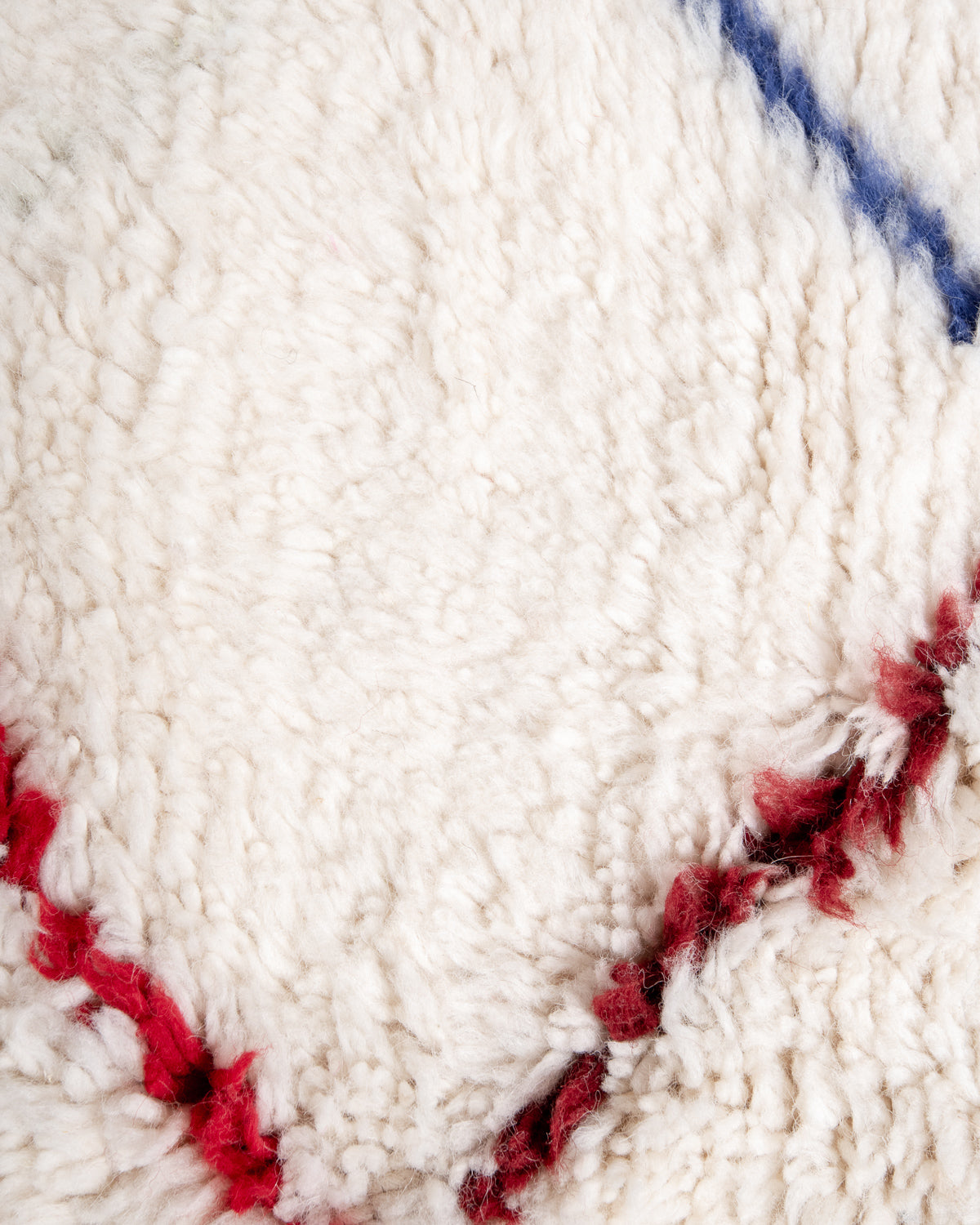 Modern, designer, handcrafted Berber rug from Morocco. Beniourain carpet with beautiful colours and patterns and fluffy wool texture.